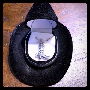 Silver cowboy boot necklace in velvet cowboy hat